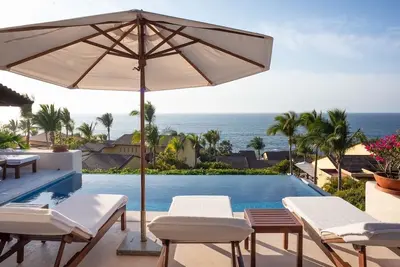Image de Offre De DERNIÈRE Minute Élégance décontractée dans les villas privées Four Seasons.