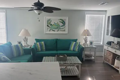 Image de Maison de plage confortable avec voiturette de golf