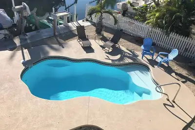 Image de 5 Pirates Hideaway - Canal Front Accueil avec piscine et digue pour votre bateau