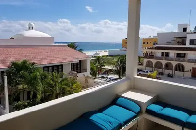 Image de Condo sur la plage (B3), vue sur l'océan, piscine, en ville, paddle bd, kayaks, vélos, équipement de plage