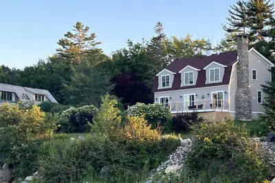 Image de «Rooster Cottage» Harbourside avec quai en eau profonde et amarrage