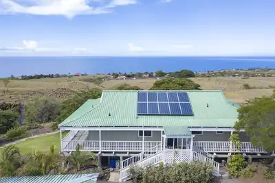 Image de Belle vue sur l'océan et le coucher du soleil sur 3 acres de terrain privé.