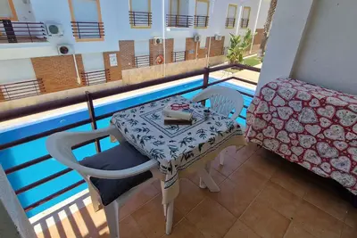 Image de Appartement 1 chambre avec balcon au bord de la piscine, climatisation, très proche de la plage.