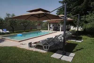 Image de Grand appartement au rez-de-chaussée adapté aux familles avec 2 salles de bains pour 4 à 6 personnes