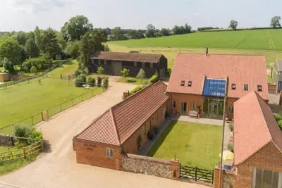 Image de The Dairy est une superbe conversion d'une grange traditionnelle de Norfolk