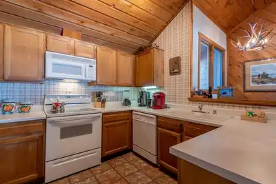 Image de Condo Elkhorn confortable hors du terrain de golf avec cheminée et Dollar Mt. Vues