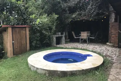 Image de Cabane avec jacuzzi à côté de la réserve écologique de Montealto