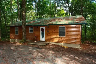 Image de La cabine Lieu-Luxe de Doc avec bain à remous, sentiers de Vtt, et isolé dans les bois