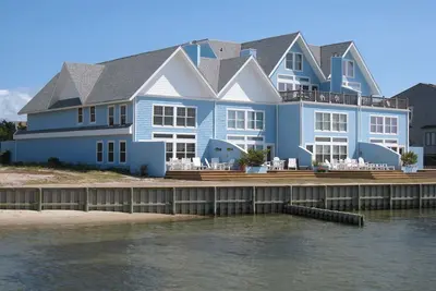 Image de Bord de l'eau: condo Soundfront avec des couchers de soleil spectaculaires.