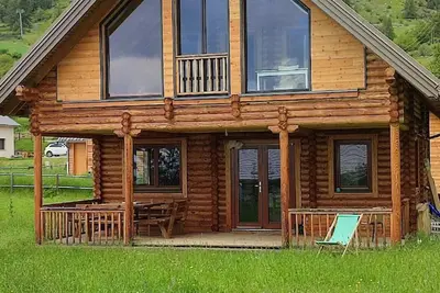 Image de Irresistible log cabin, facing south, valley view, close to trails and hiking.
