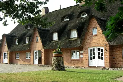 Image de Seeschlößchen au toit de chaume, maison mouette falaise, à seulement 200m de la plage, WiFi