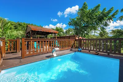 Image de Gîte de charme 4* au calme avec jacuzzi, piscine et jardin tropical, 2 à 5 Pers.