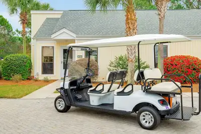 Image de Magnolia côtier ~ Golf Cart inclus! ~ Tram Gratuit & Wifi ~ Près de la plage