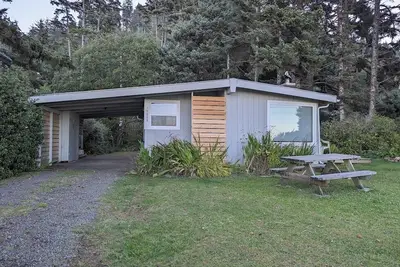 Image de Cabine avec vue sur l'océan à Cove Beach