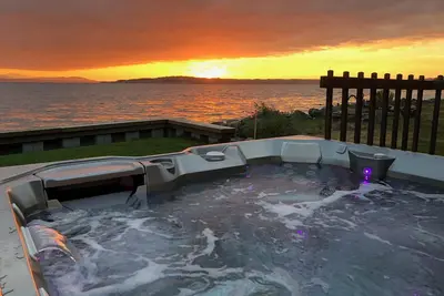 Image de Sud, maison de plage Ă 20 pieds de l'eau! Kayaks et un nouveau bain Ă remous