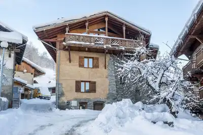 Image de Chalet de ski avec services: ferme de 260 ans avec une vue imprenable sur la montagne