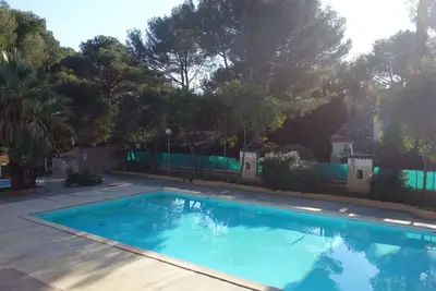 Image de Bel appartement pour 4 personnes avec Wifi, climatisation, piscine, Tv, terrasse et parking
