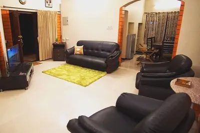 Image de Nandhanam Eco Home Stay Ac avec options de vélo \/ voiture