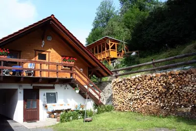 Image de Appartement 1 de style cabane en rondins dans la station thermale climatique Altenbrak Harz avec oasis de bien-être