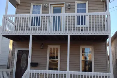 Image de Home Cinq ÉTOILES - Beach House avec badges de plage