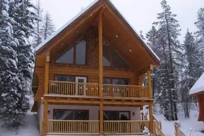 Image de Cabane en rondins dans les bois