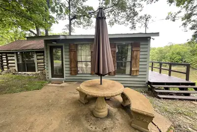 Image de Cabine privée @ lac Enid. 6 miles de rampe de bateau. . . terrain avec étang et chasse