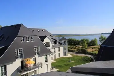 Image de Fantastique appartement avec vue sur le lac, directement sur les backwaters et le club de golf