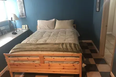 Image de Grande chambre, salle de bain et cuisine du locataire, avec coin salon et terrasse
