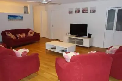 Image de Maloneys Beach House - Animaux acceptés et juste en face de la plage de Maloneys