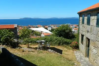 Maison en pierre avec vue imprenable sur la plage 10 min à pied
