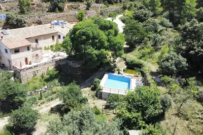 Image de Appartement moderne dans masia rénové dans les montagnes à proximité du village