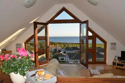 Image de Penthouse de luxe sur la plage avec une vue imprenable sur la mer