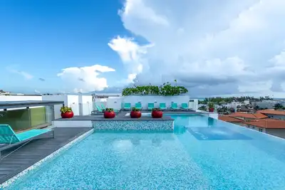 Image de Paradise Ă Playa; condo de luxe avec piscine sur le toit 2bd / 2. 5 salles de bain, toute la famille