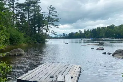Image de Loon Landing - Chalet rustique sur le lac Mooselookmeguntic. Très privé!