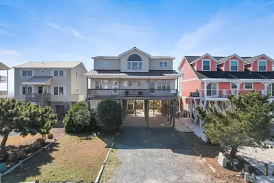 Image de Vacances comme un champion à \"Tiger Den\" Fantastique maison Ocean Front avec 2 espaces de vie et une vue imprenable sur l'océan sur l'extrémité tranquille de l'ouest.