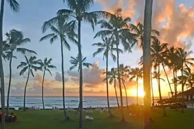 Image de Poipu Beach Condo vue sur l'océan au dernier étage avec piscine, tennis, salle d'exercice