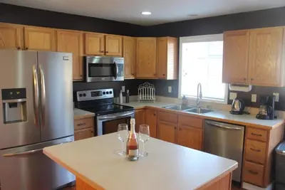 Image de Luxueuse maison de ville à quelques minutes du magnifique centre-ville, d'un parcours de golf et d'un domaine skiable