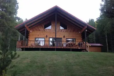 Image de Maison en rondins isolée Glacier Meadow 300 $. 00 - 400 $. 00 par nuit