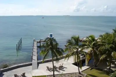 Image de Sunset Reef - 4 ch, domaine privé fermé Bayside, piscine, spa, quai en eau profonde