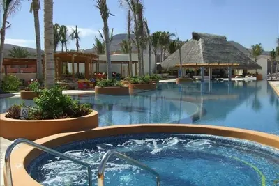 Image de Plage, piscine, terrain de golf et de nombreux équipements: