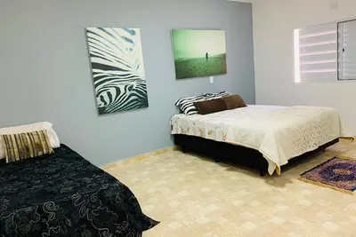 Image de House Ground Season avec 4 chambres et 3 suites meilleure plage de Guarujá! !