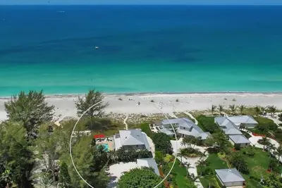 Image de Exquise front de mer avec piscine privée et superbes vues sur le golfe!