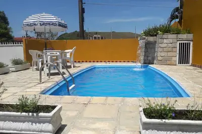 Image de Maison avec plage Piscine Martim de Sá à Caraguatatuba 04 chambres