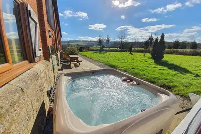 Image de Helena House avec bain à remous privé, pour 8 personnes