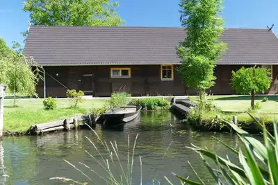 Image de La grange: maison en rondins de Spreewald à Lehde avec sauna, cheminée et son propre port