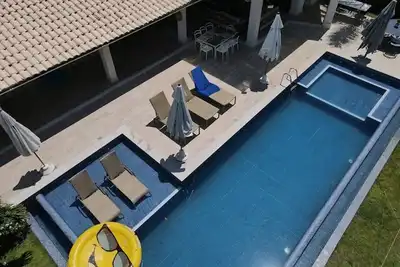 Image de Maison confortable au bord de l'océan à Guarajuba 5\/4. 20 lits. Contactez nous!