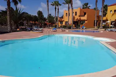Image de Appartements avec 1 et 2 chambres, 3 piscines entourées de jardins Centric