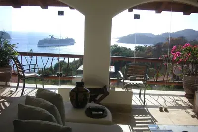 Image de Condo de luxe avec vue imprenable et couchers de soleil