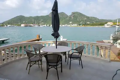 Image de Maison mitoyenne au bord de l'eau à Caribbean Marina, à 5 minutes de la plage de rêve