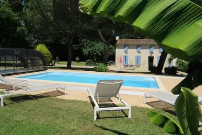 Image de Maison de charme en pierres à Nancras avec piscine et grand jardin clos ombragé